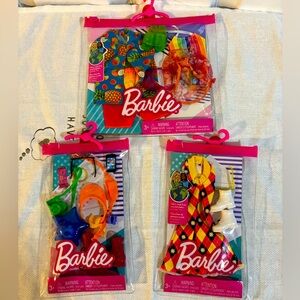 Barbie and Ken clothes and accessories new.